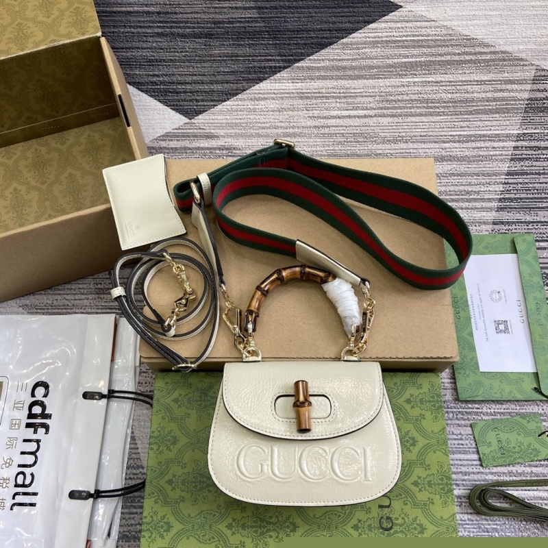 G*u*i top handle bags